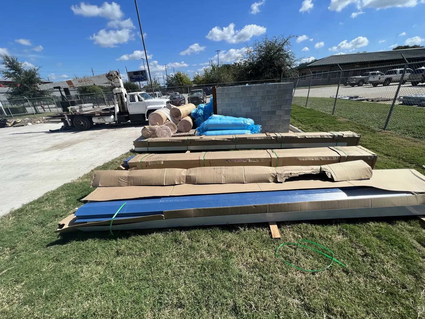 Insulated building panels staged for installation