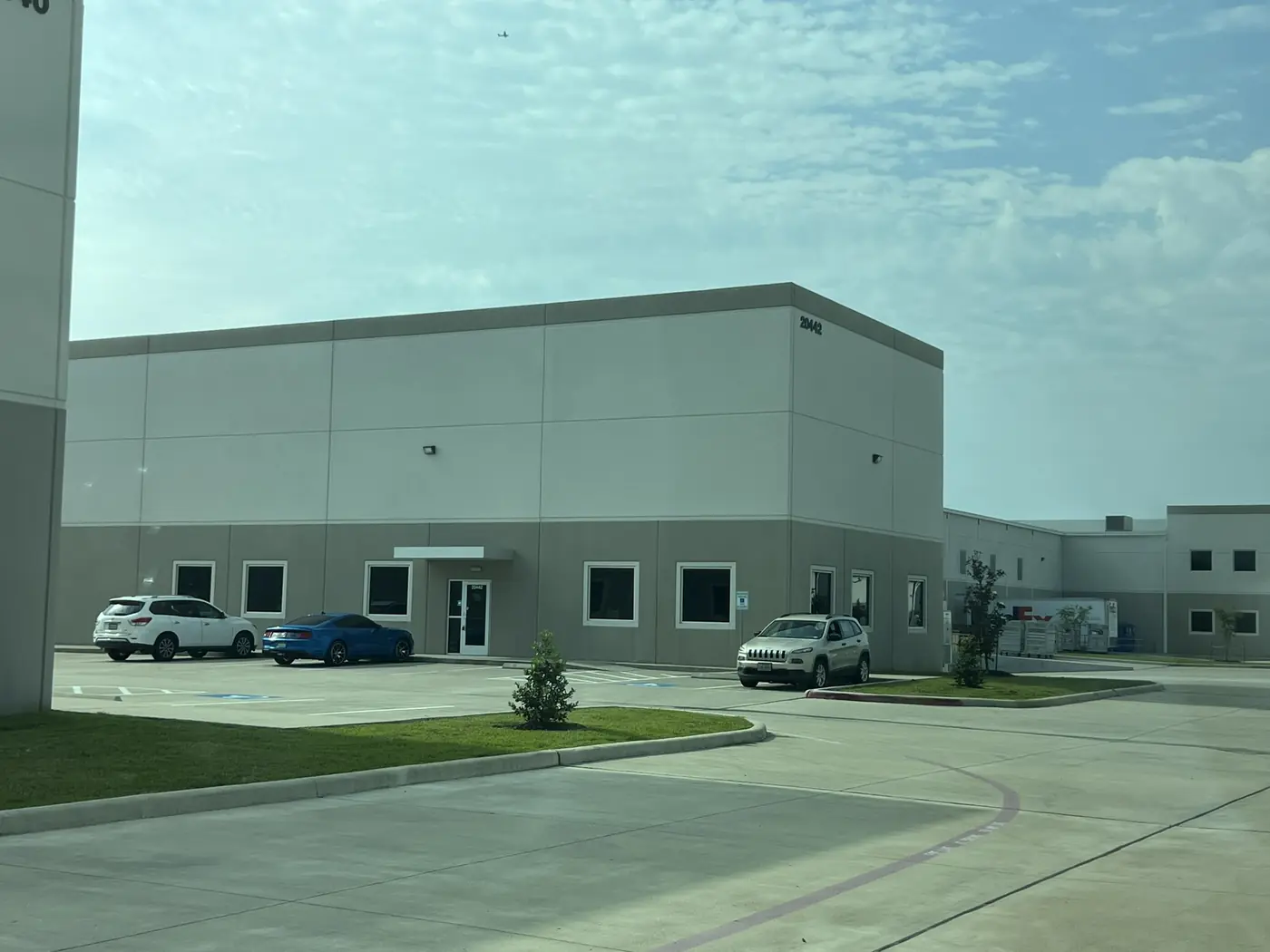 Completed light industrial facility with paved service access