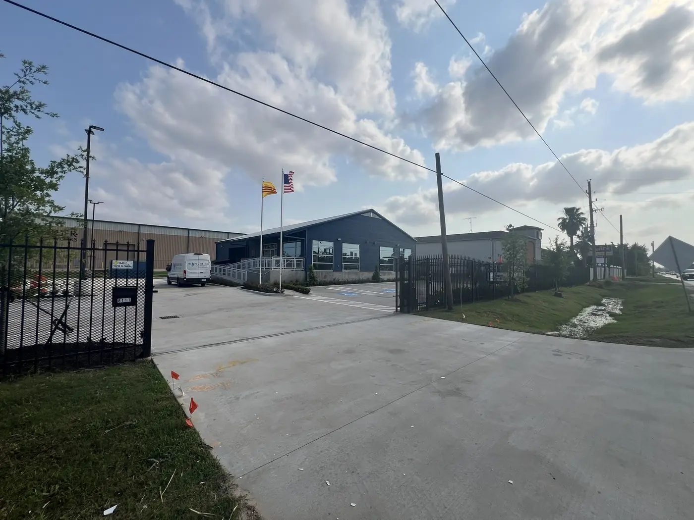 Gated approach to a completed group of industrial buildings