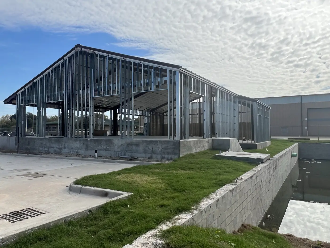 Light industrial building shell with steel framing and exterior panels