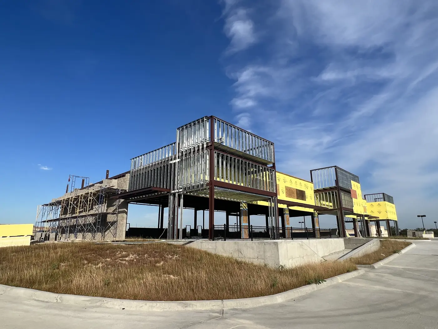 Two-story commercial steel frame under construction