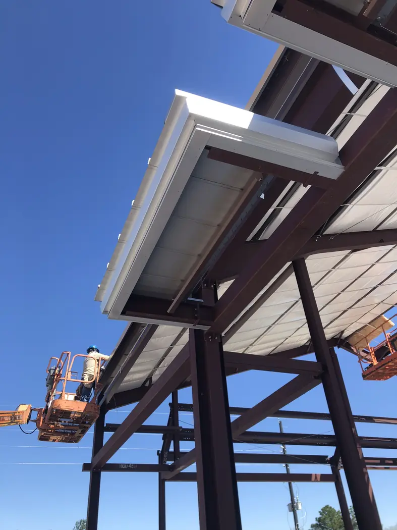 Close view of steel canopy framing at a clinic building