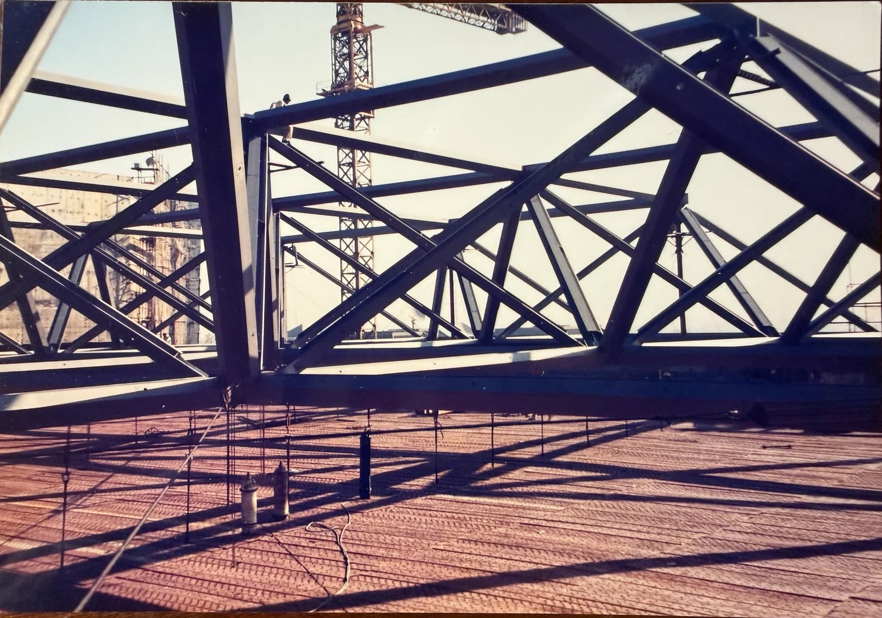 Steel truss modules above a hotel atrium during erection
