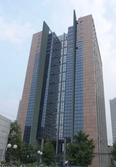 Street-level view of a completed high-rise hotel tower