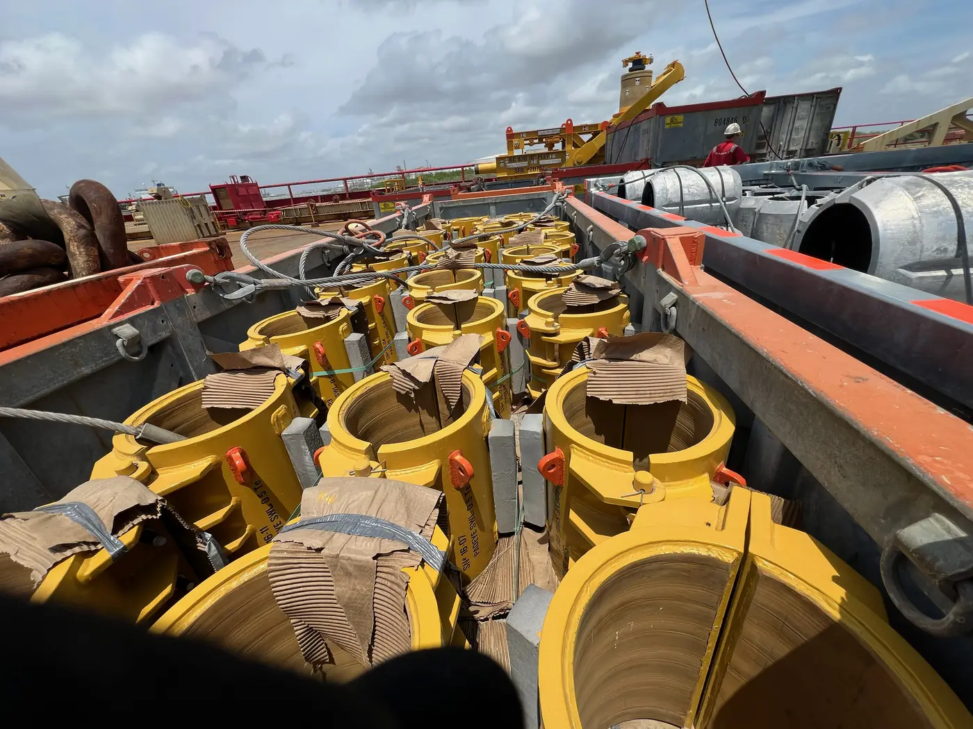 Specialized pipeline-handling components staged for field operations