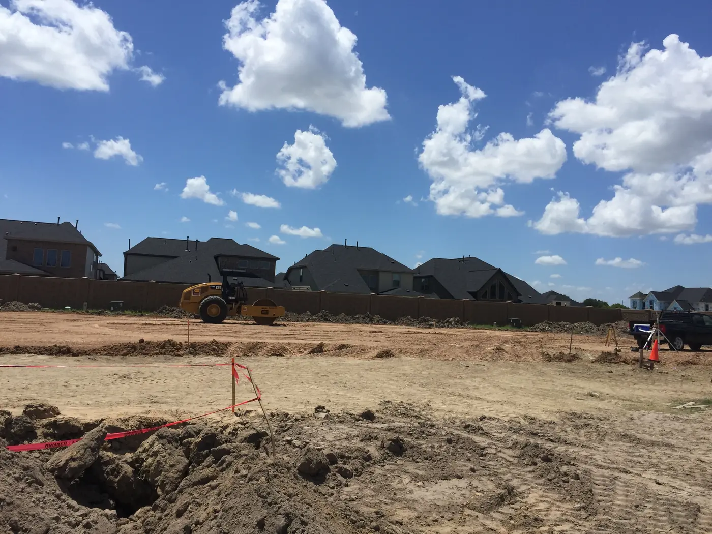 Rough-graded development area under a clear sky